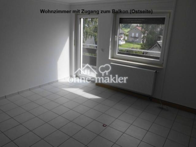 Wohnzimmer mit Balkonausgang
