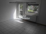 Wohnzimmer mit Balkonausgang
