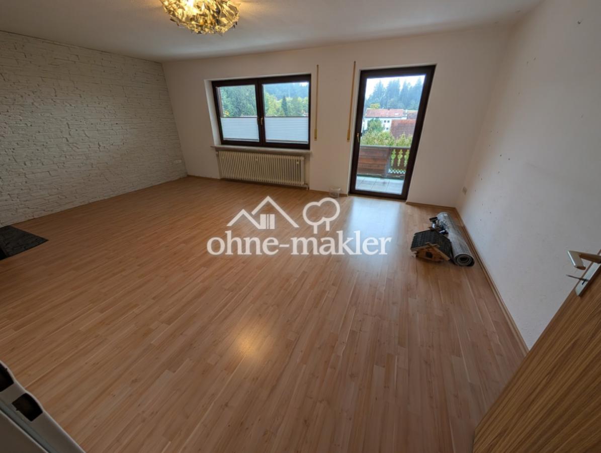 Wohnzimmer mit Kamin OG