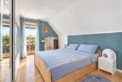 Schlafzimmer mit direktem Balkonzugang und angenehmer Atmosphäre