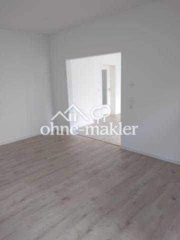 Wohnzimmer Blick zur Küche mit