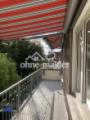 Balkon mit Markisen
