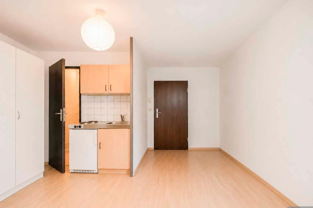 Wohnzimmer mit Küche