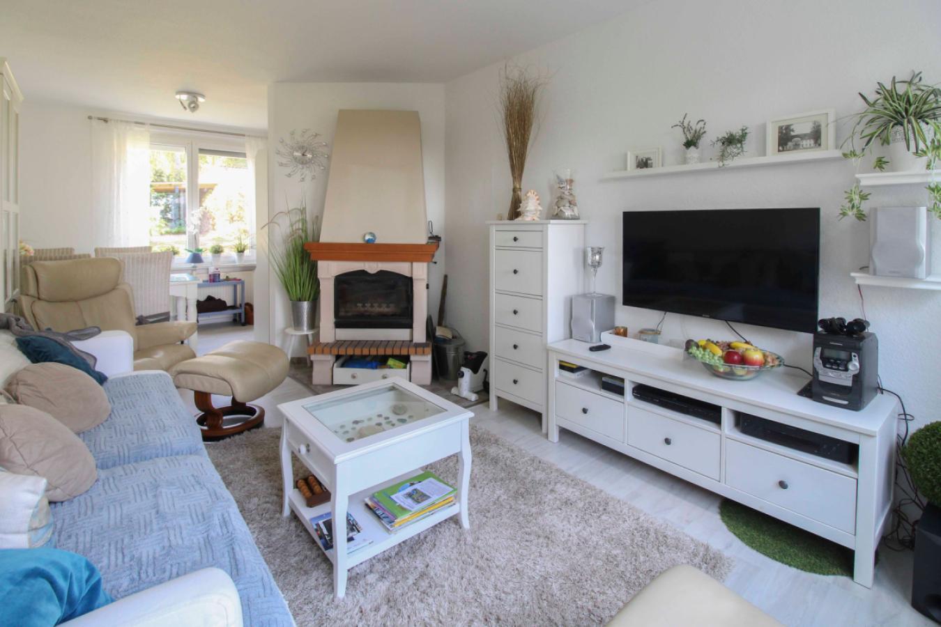 Wohnzimmer mit Kamin