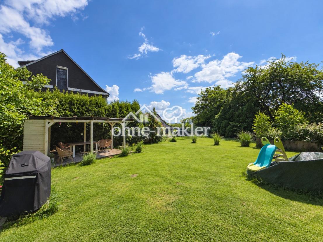 Garten und Rückansicht Haus