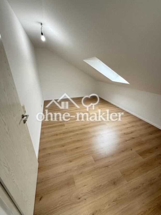 Schlafzimmer mit Dachfenster