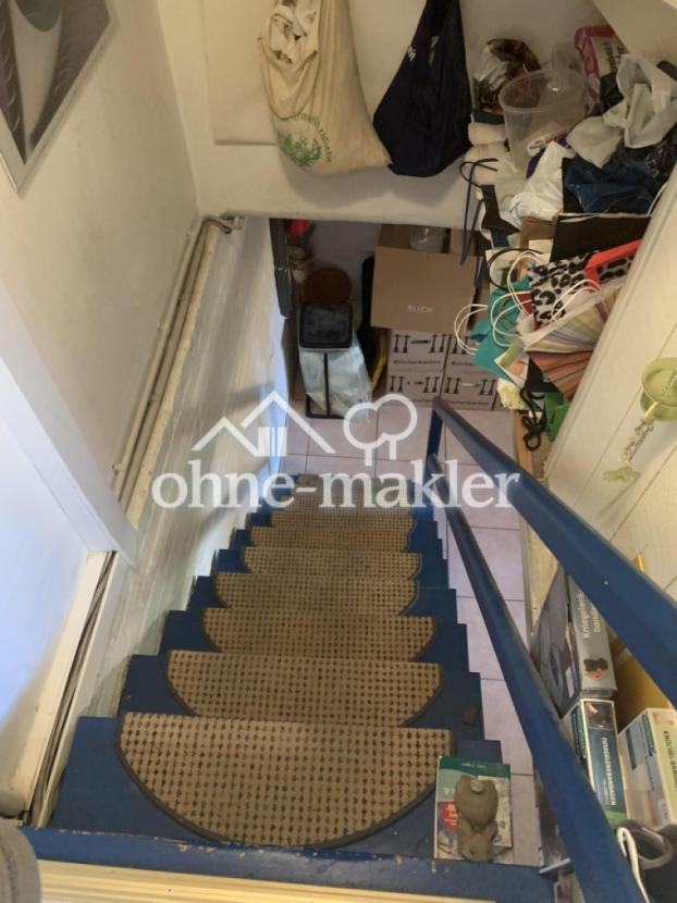 Treppe zum Obengeschoss
