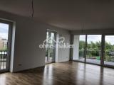 Offene Wohnküche mit Balkon