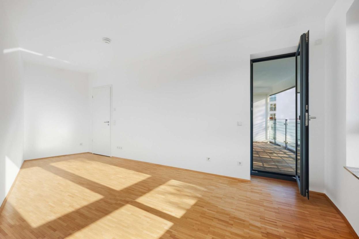 Schlafzimmer mit Balkonzugang