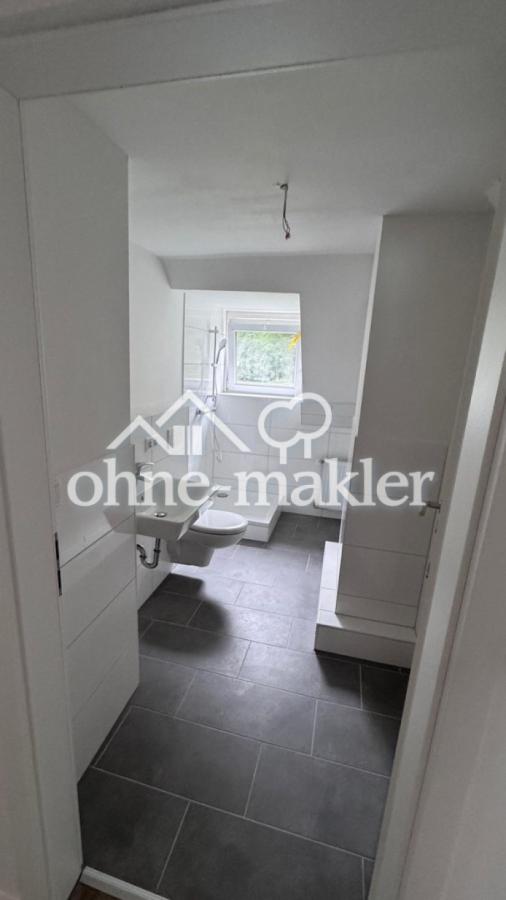 Badezimmer, neu gefliest (baug