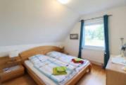 Großes Schlafzimmer mit Ankleide