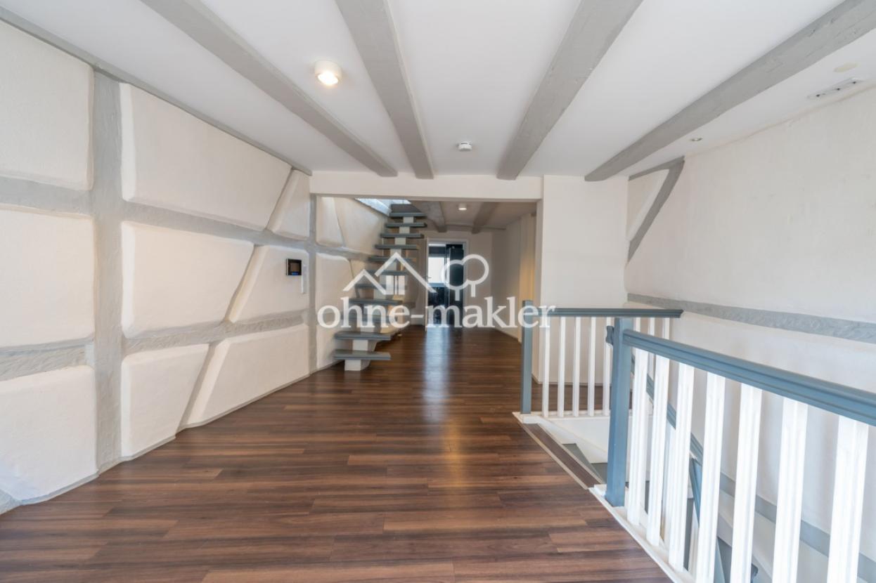 Offene Galerie mit Treppe