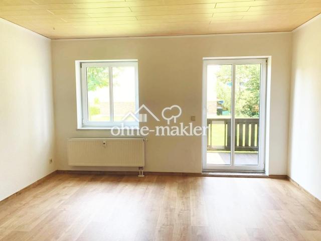 Wohnzimmer mit Balkon