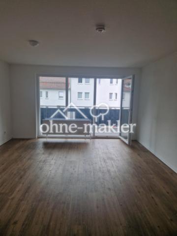 Wohnzimmer mit Balkon