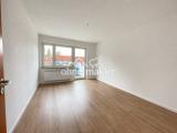 Wohnzimmer mit Balkon