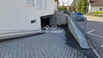 Einfahrt mit elektrischem Tor