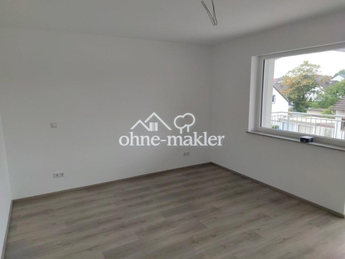 Schlafzimmer mit Balkonzugang