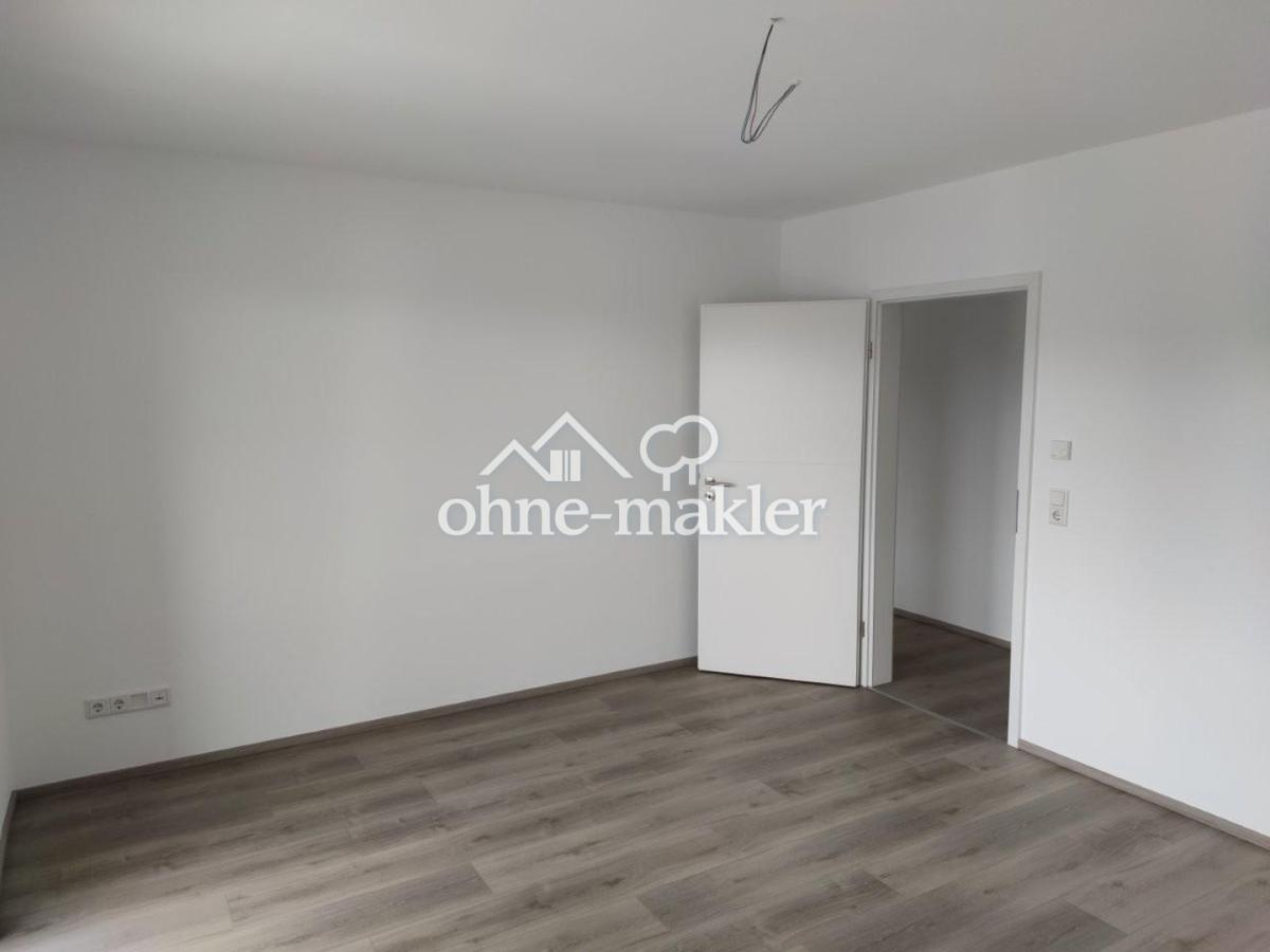 Schlafzimmer mit Balkonzugang