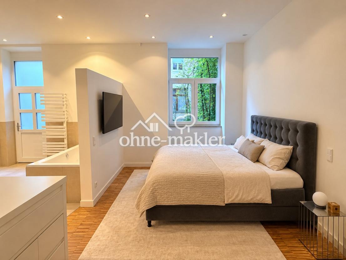 Schlafzimmer mit Spa-Bad